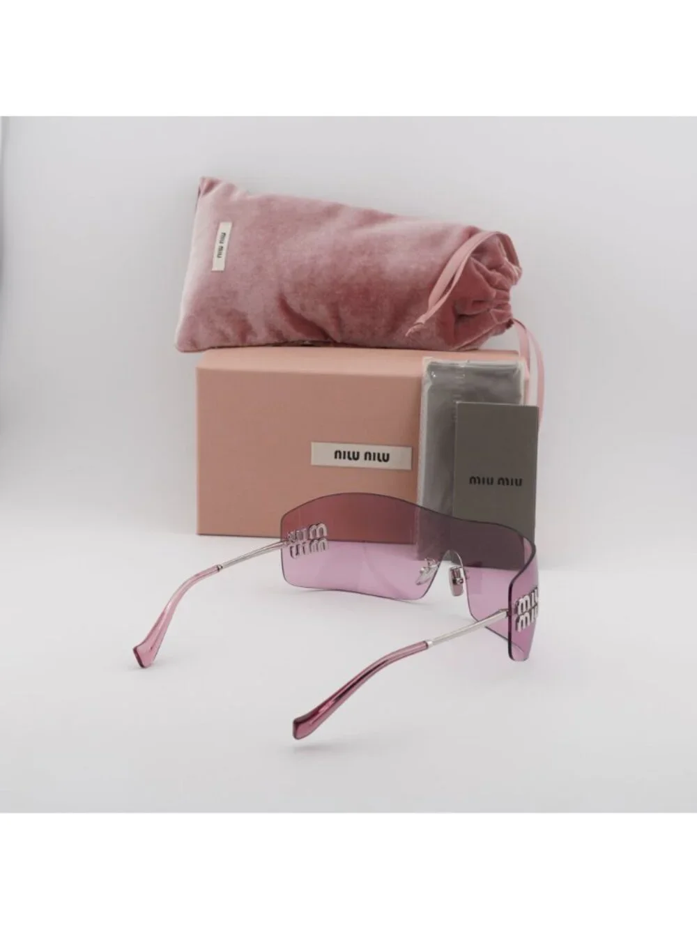 Miu Miu MUB53S 1BC70Y Sunglasses Silver Rimless Shield Frame, Pink Lenses